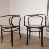 Curved wood and cane armchair called "Le Corbusier"
