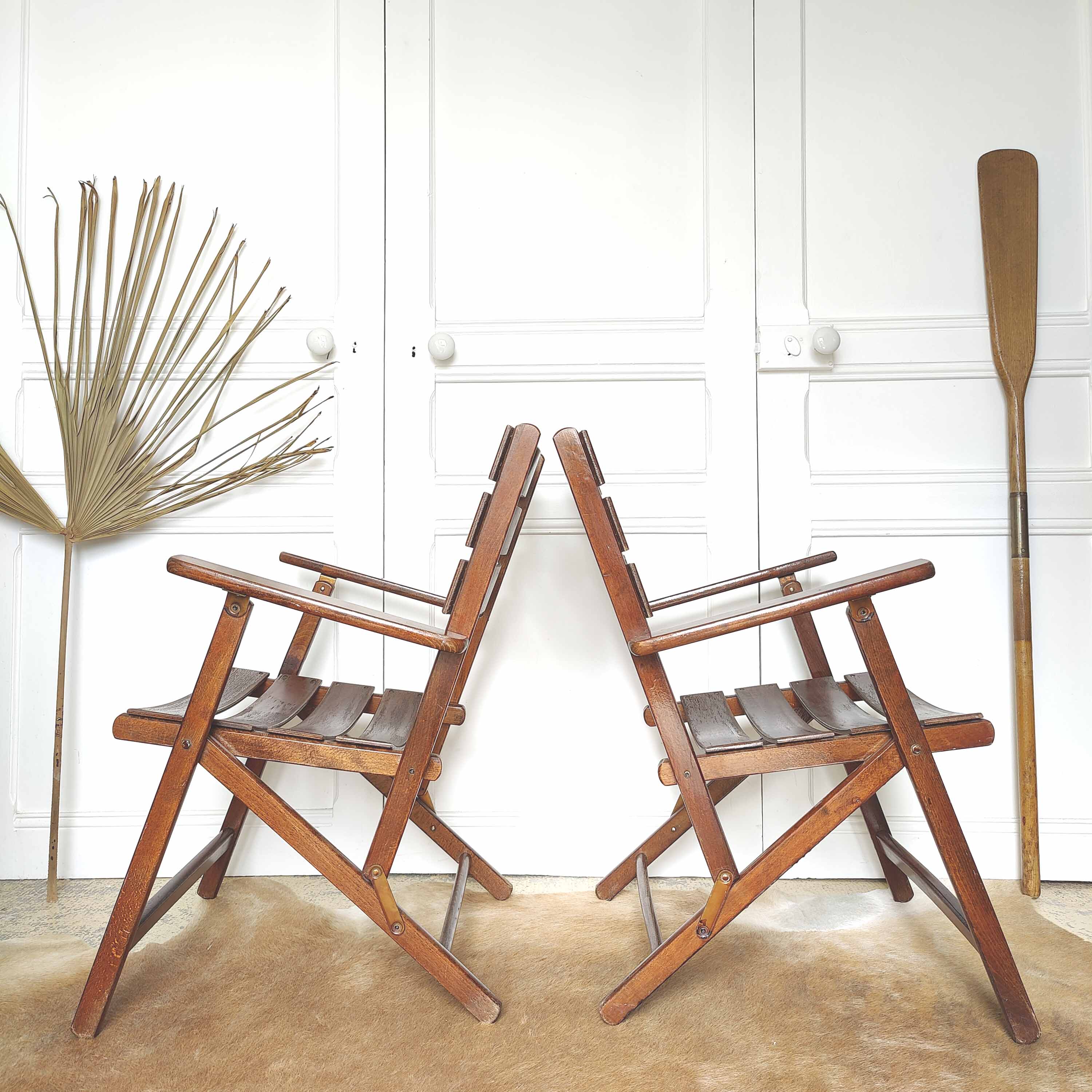 Pair of folding wooden armchairs