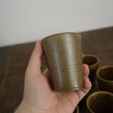 Lot of ten cups of Digoin sandstone