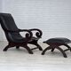 1970s, vintage armchair with footstool, black furniture leather.