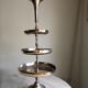 3-storey cake display in silver metal from the Mills Brussels brand. Date from the 1930s