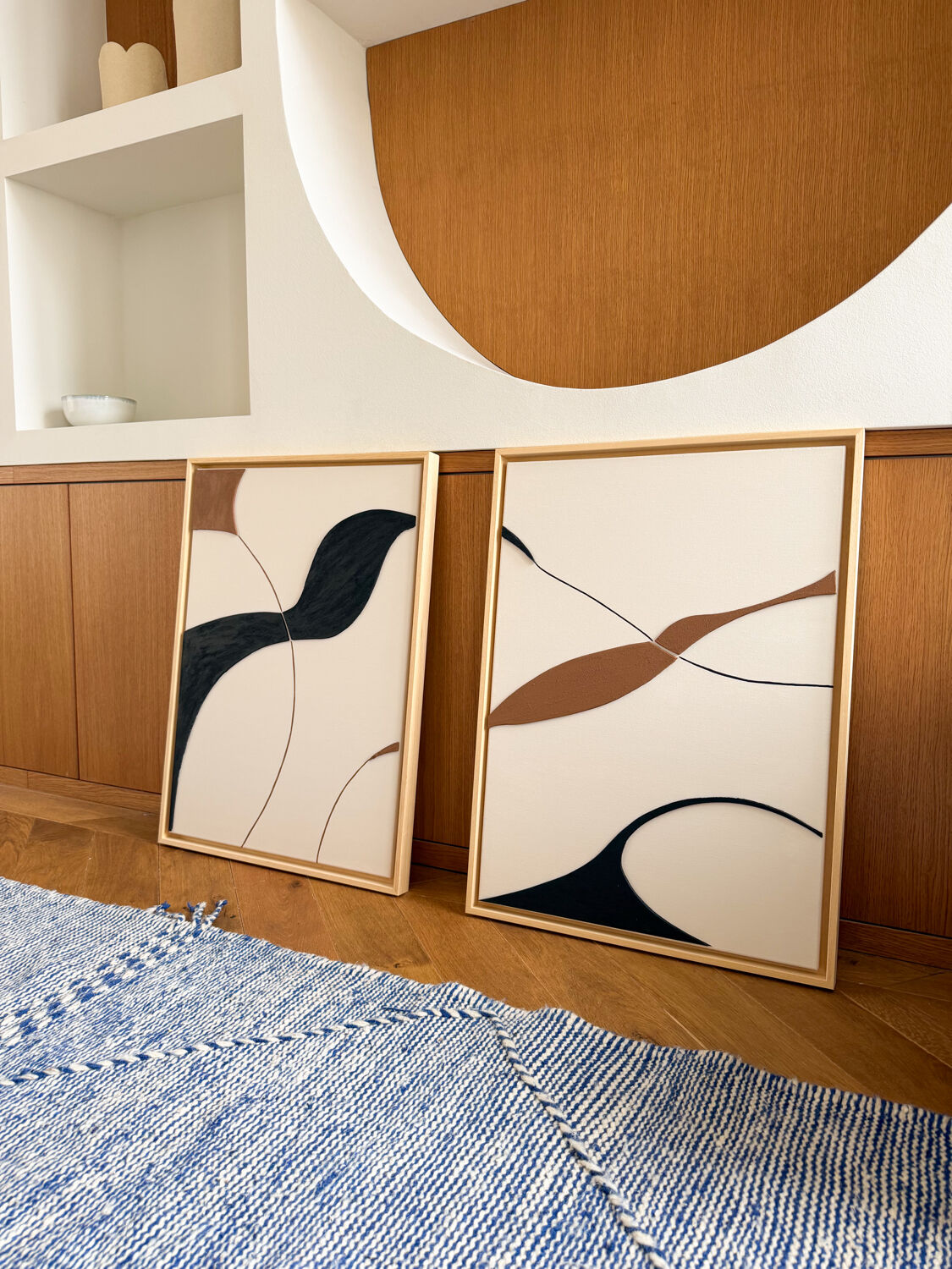 Beige, black, brown diptych design panels.