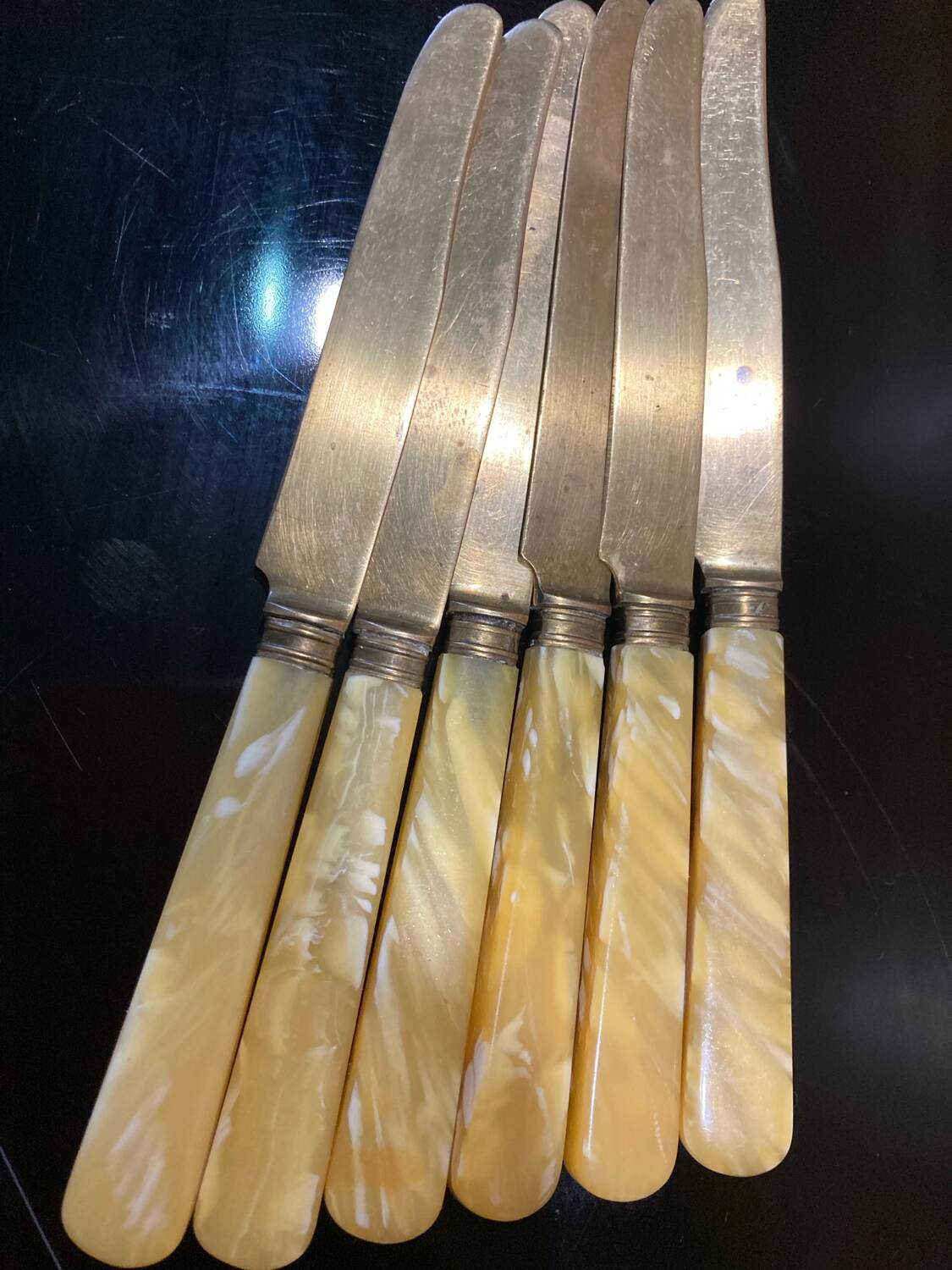 Yellow Bakelite dessert knives