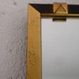 Vintage rectangular mirror with gold and black metal frame
