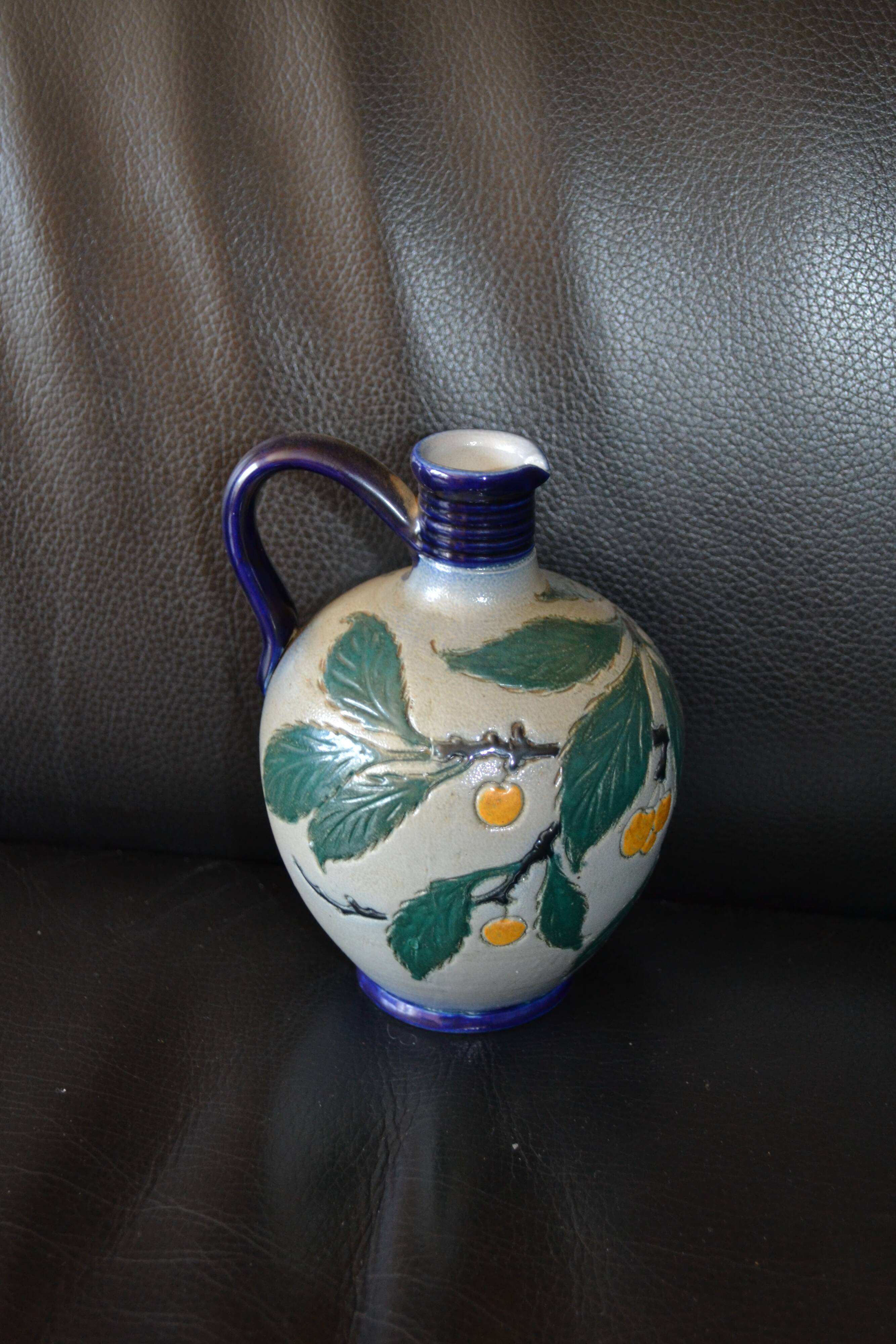 Stoneware olive oil pitcher