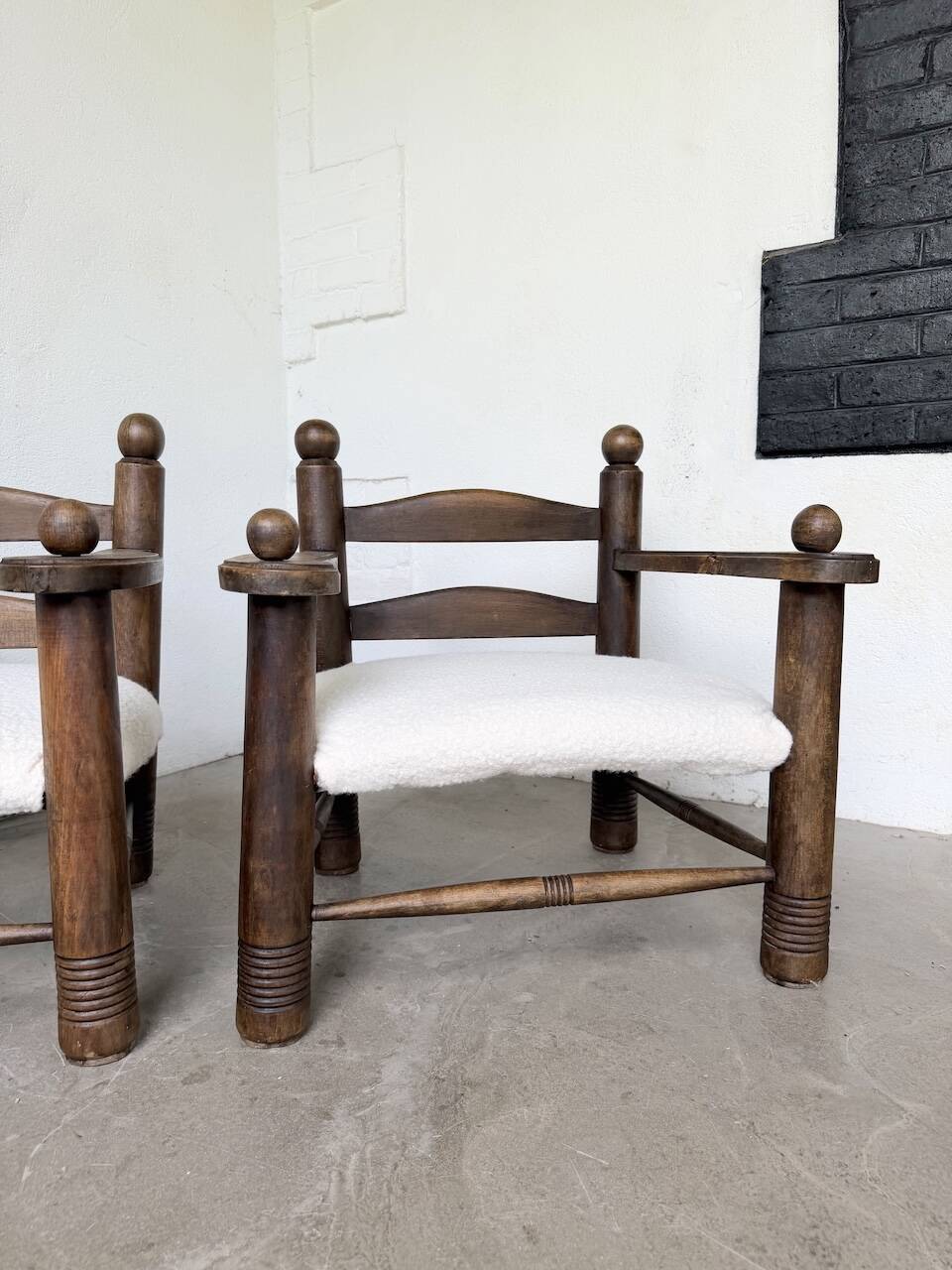 Pair of Dudouyt armchairs from the 1950s, oak.