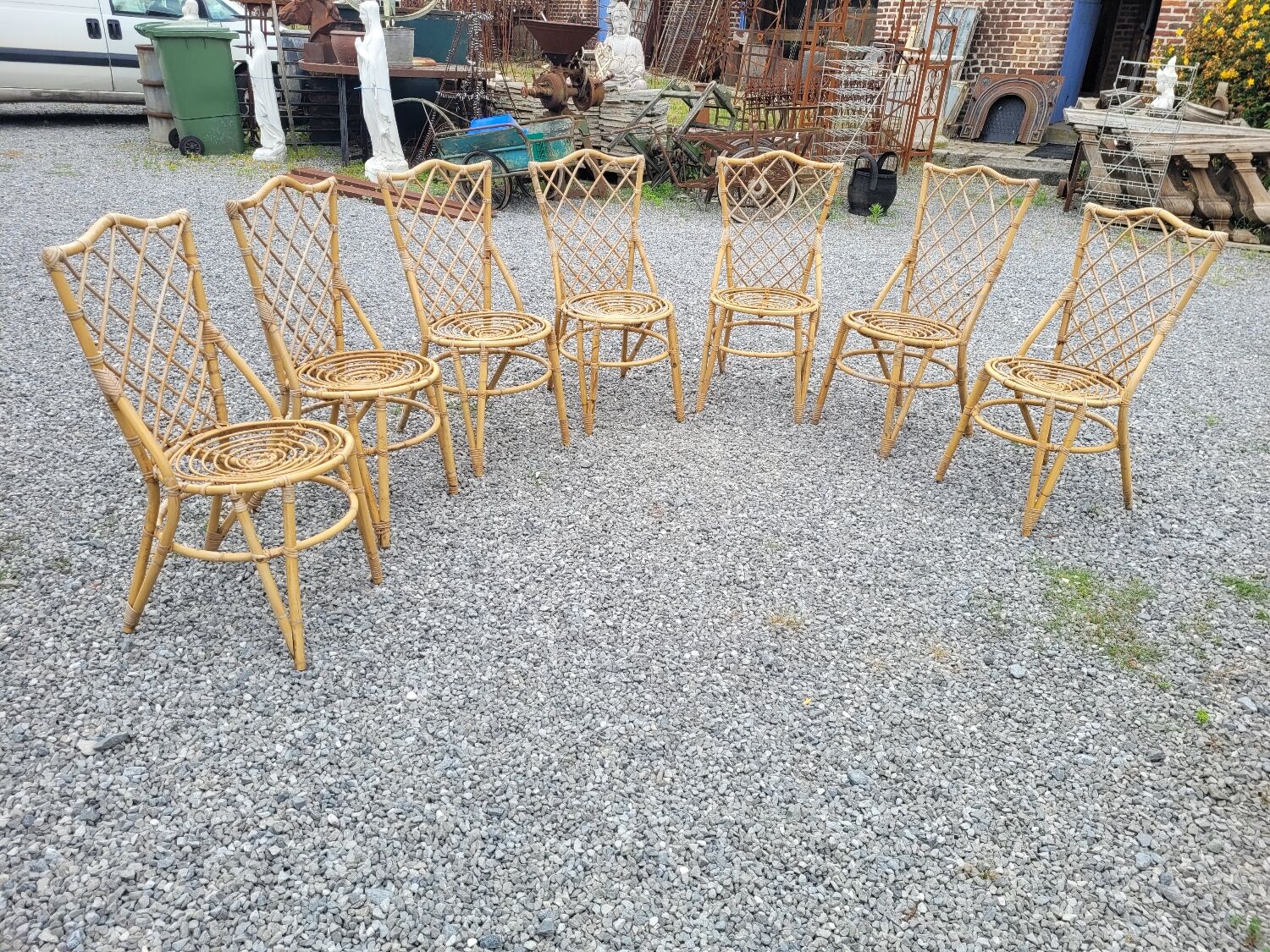 7 vintage rattan chairs