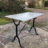 Bistro table with cast iron base, marble top, 20th century