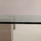 Glass table and travertine feet