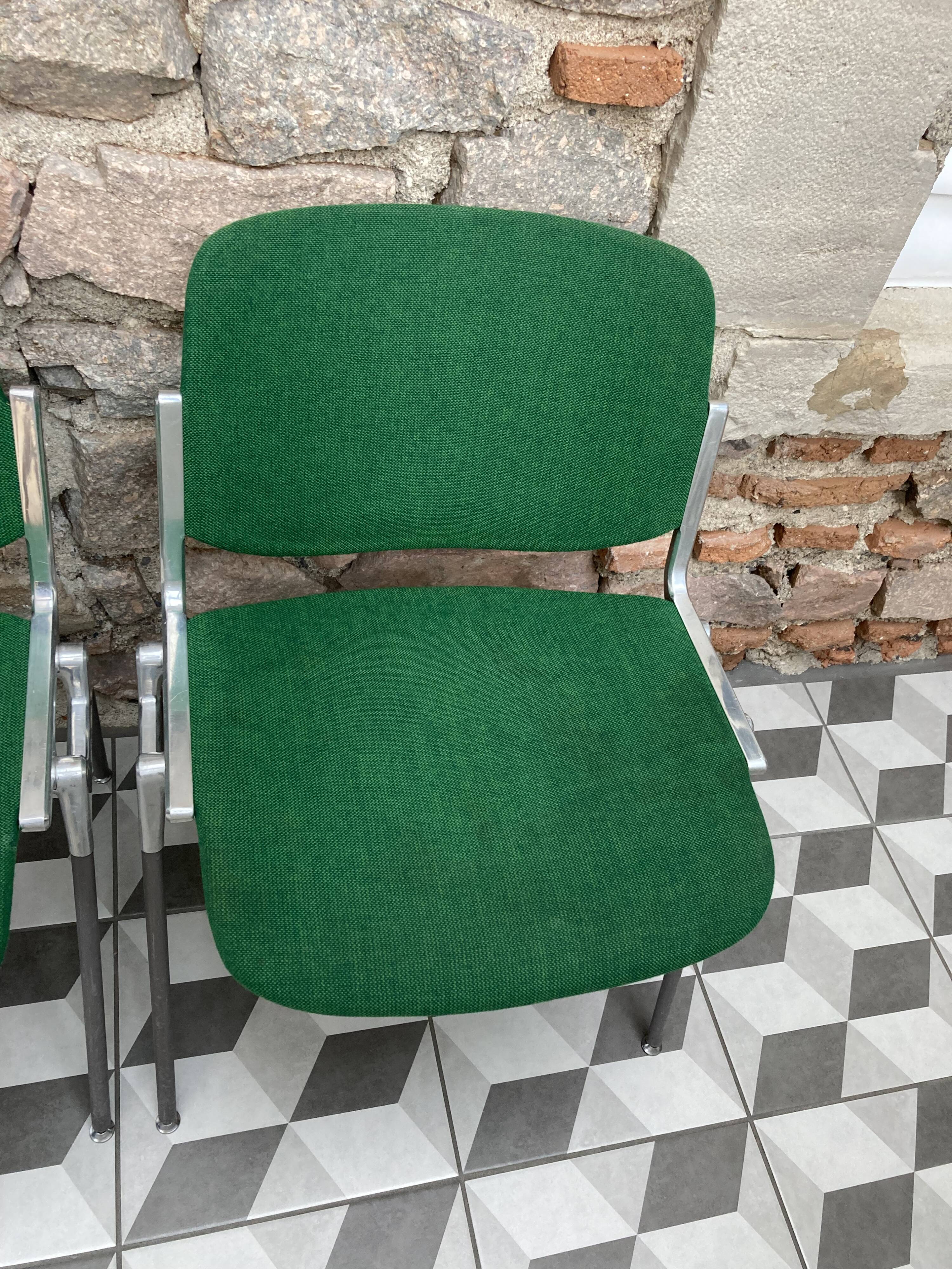 Pair of green DSC 106 chairs by Giancarlo Piretti