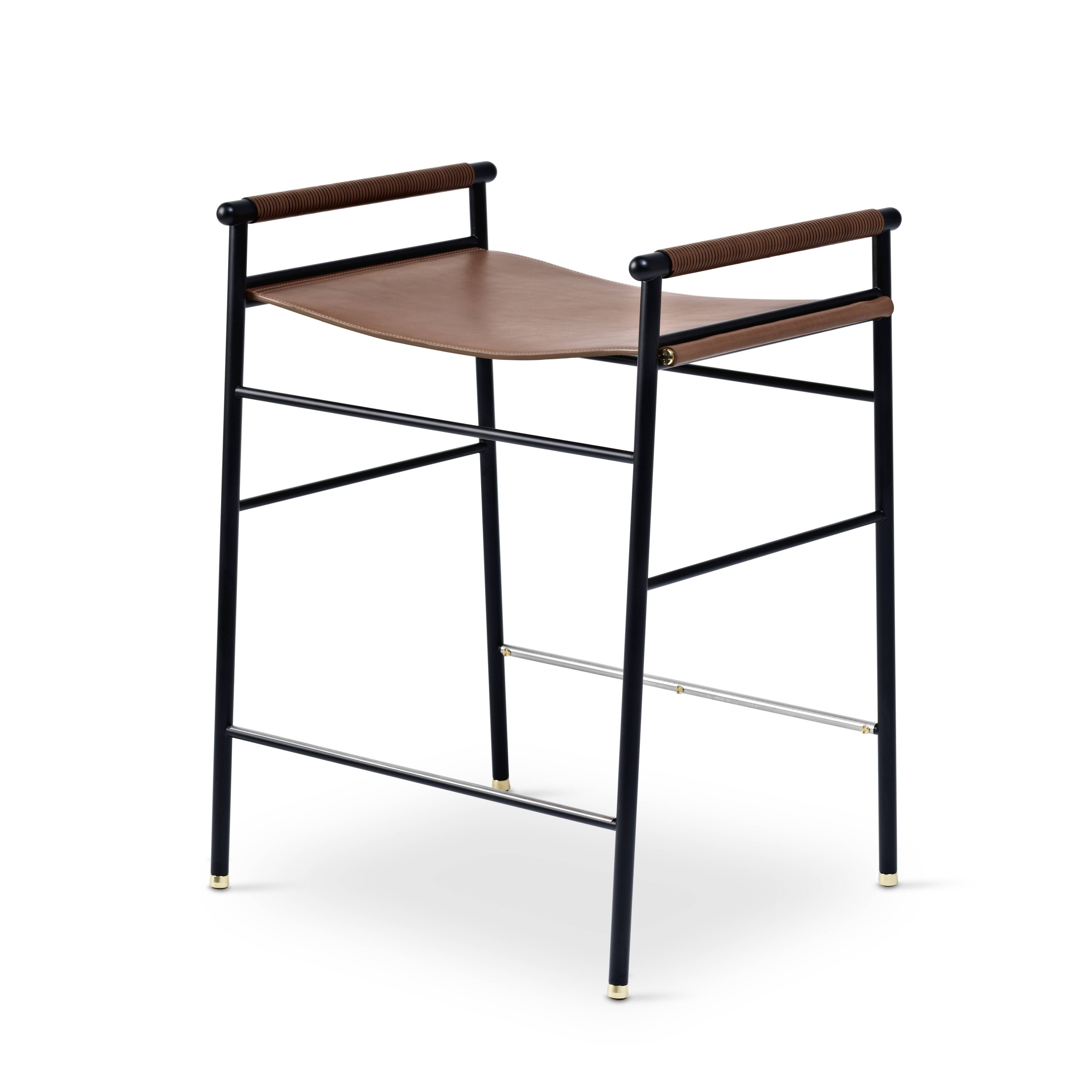 Pair of backless bar stools in brown and black metal.