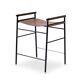 Pair of backless bar stools in brown and black metal.