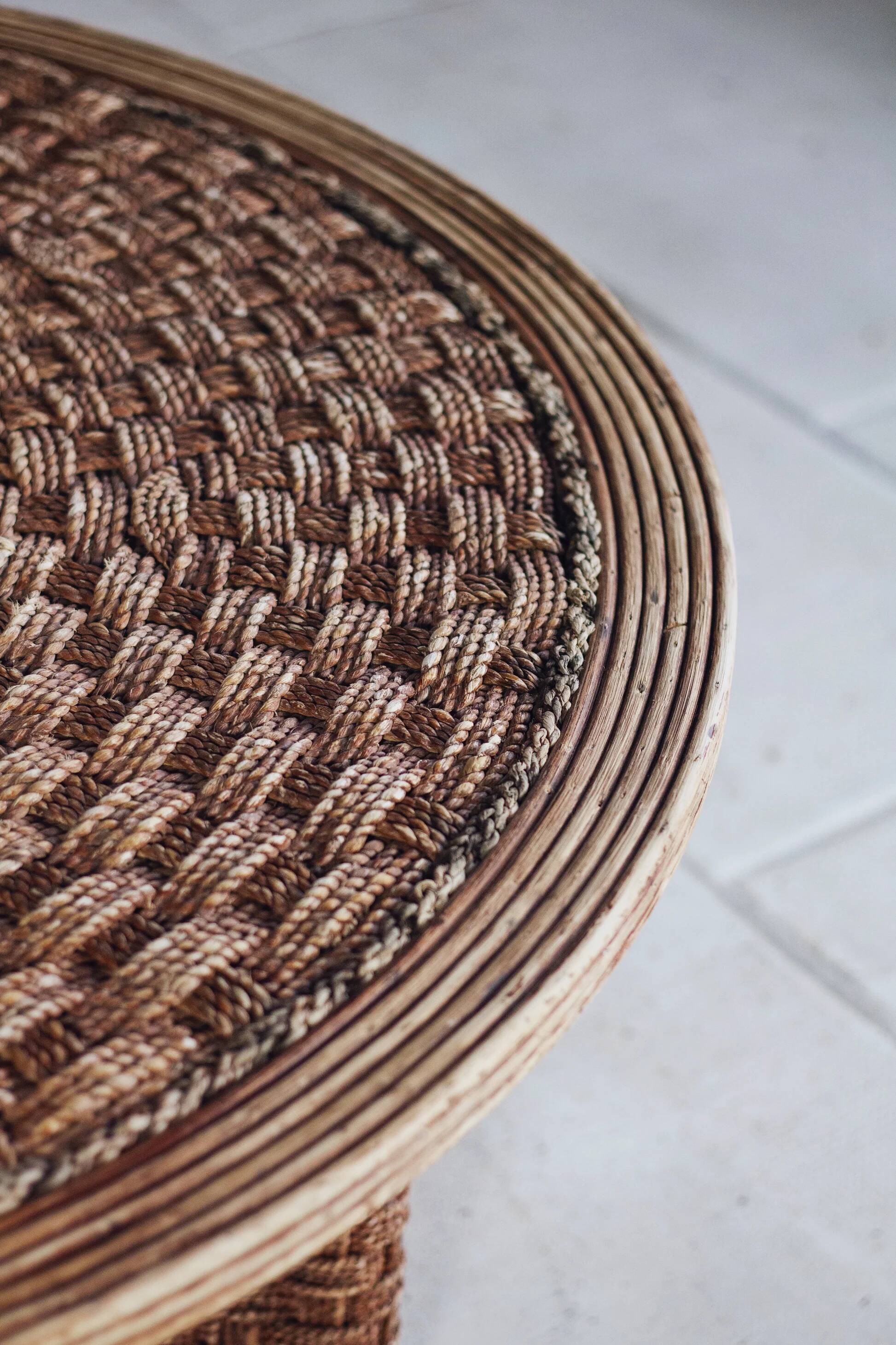 Round coffee table in braided cord and rattan, 1970.