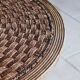 Round coffee table in braided cord and rattan, 1970.