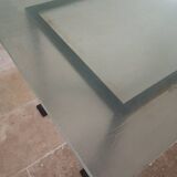 Table plateau en verre et pieds en fer forgé