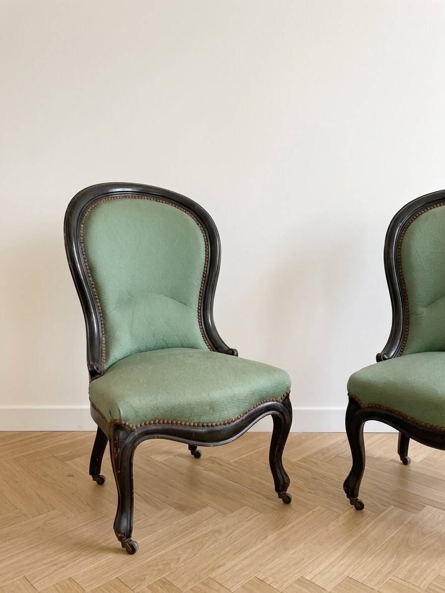 Pair of Louis XV armchairs in wood and green fabric.