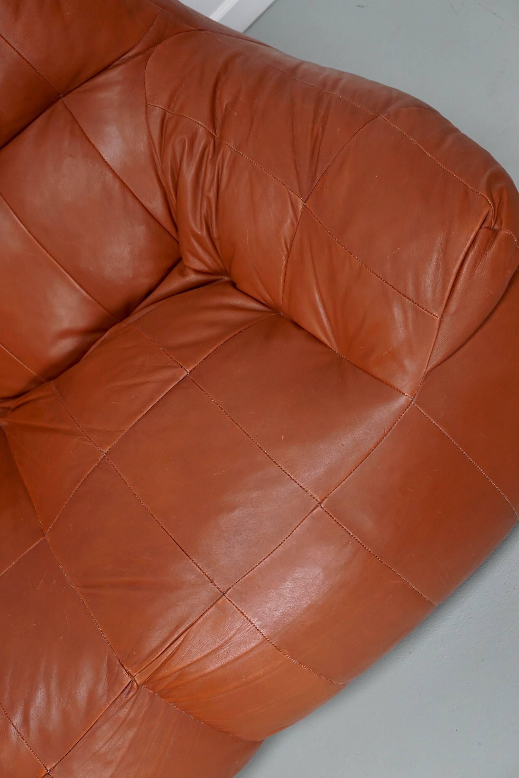 Pouf / Canapé 2 places en cuir patchwork vintage