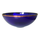 Blue fruit bowl with a golden rim by Lancel, diameter 26 cm.