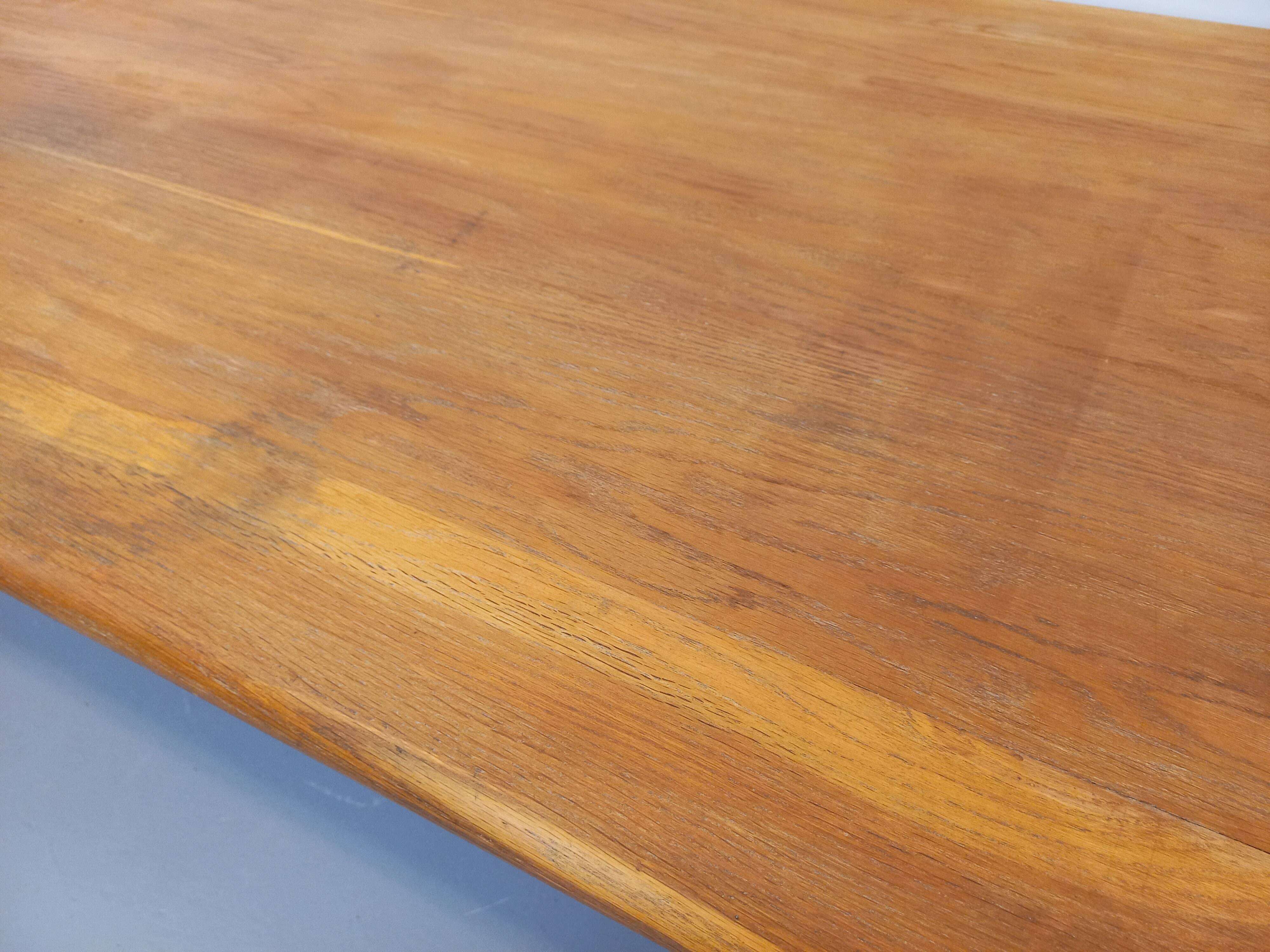 Large vintage brutalist rectangular table made of solid oak wood.