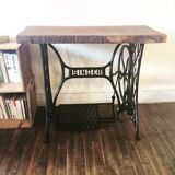 Cast iron and solid wood side table