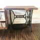 Cast iron and solid wood side table
