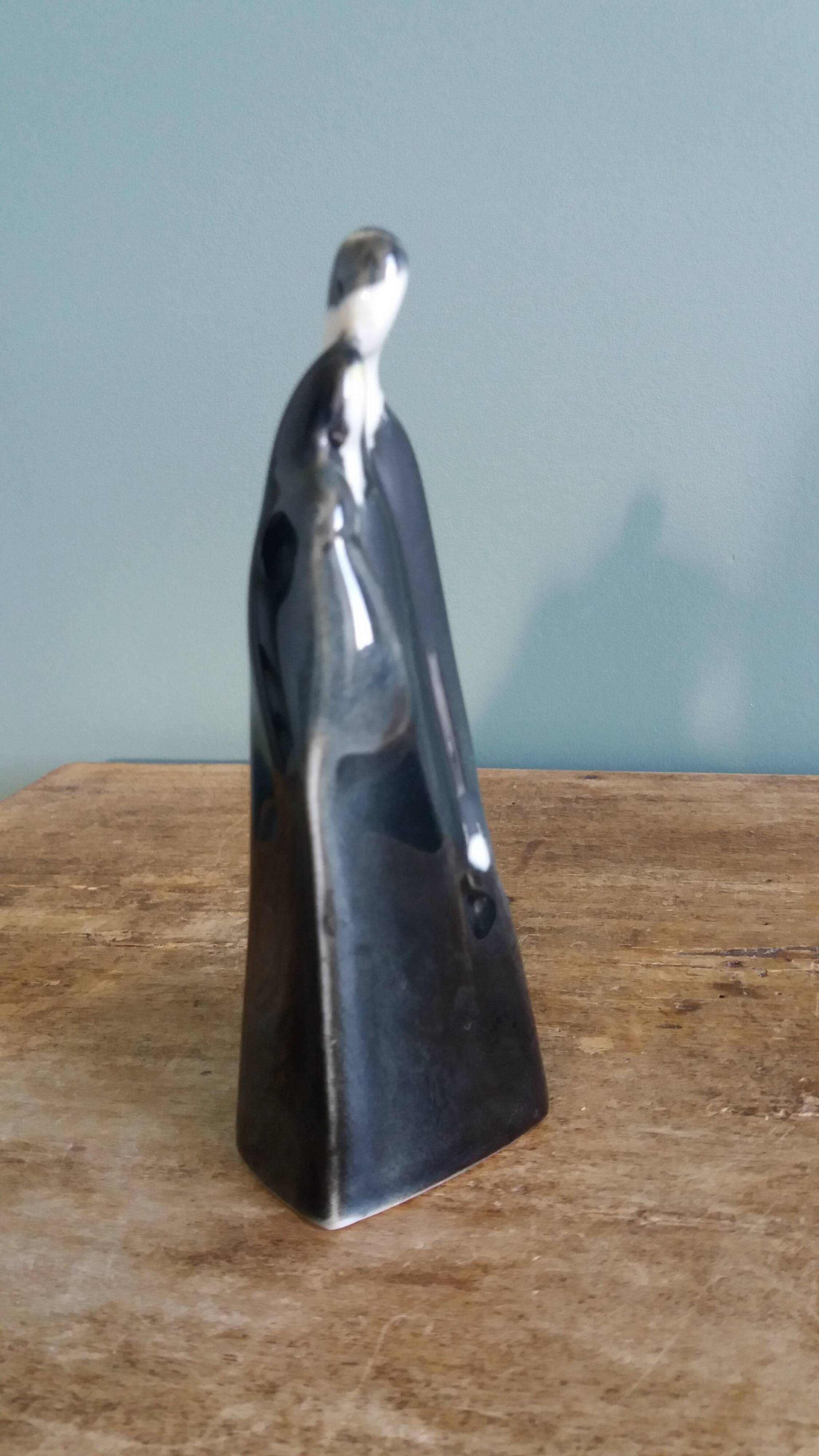 Porcelain sculpture signed Hassan Heshmat, Egypt