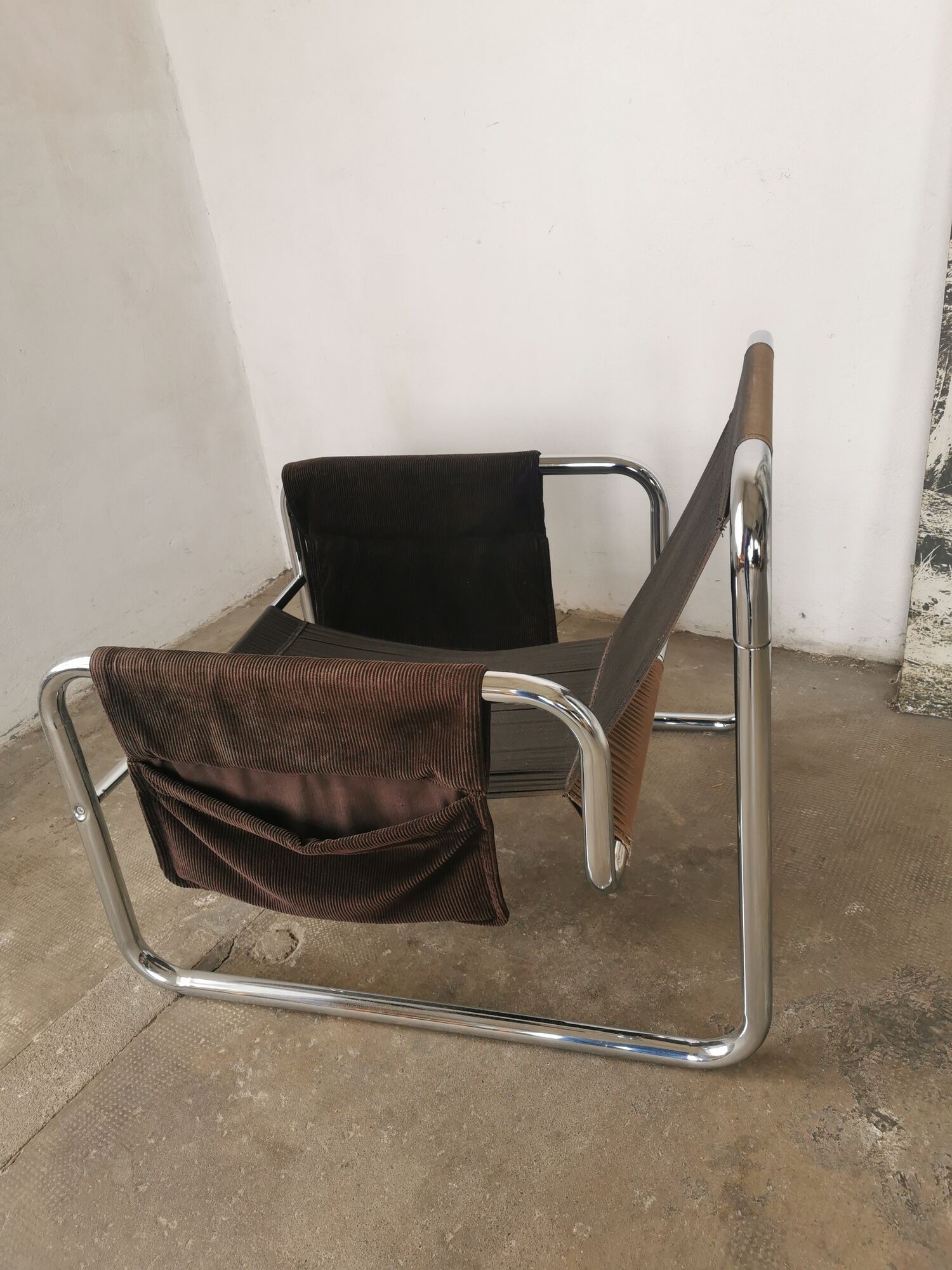 Velvet and tubular metal armchair 1980