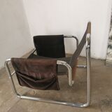 Velvet and tubular metal armchair 1980
