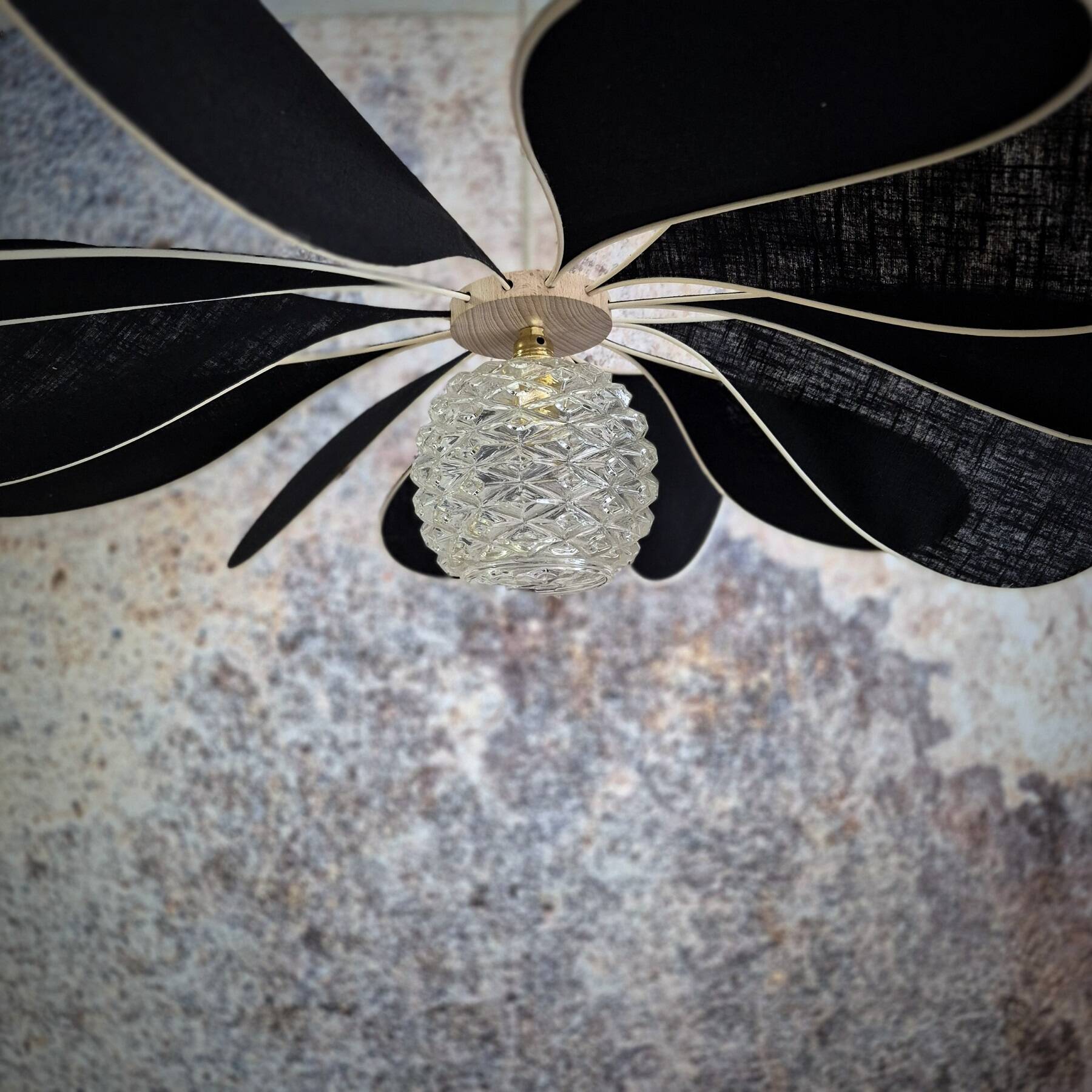 12-blade aerial suspension in rattan and black linen with vintage globe