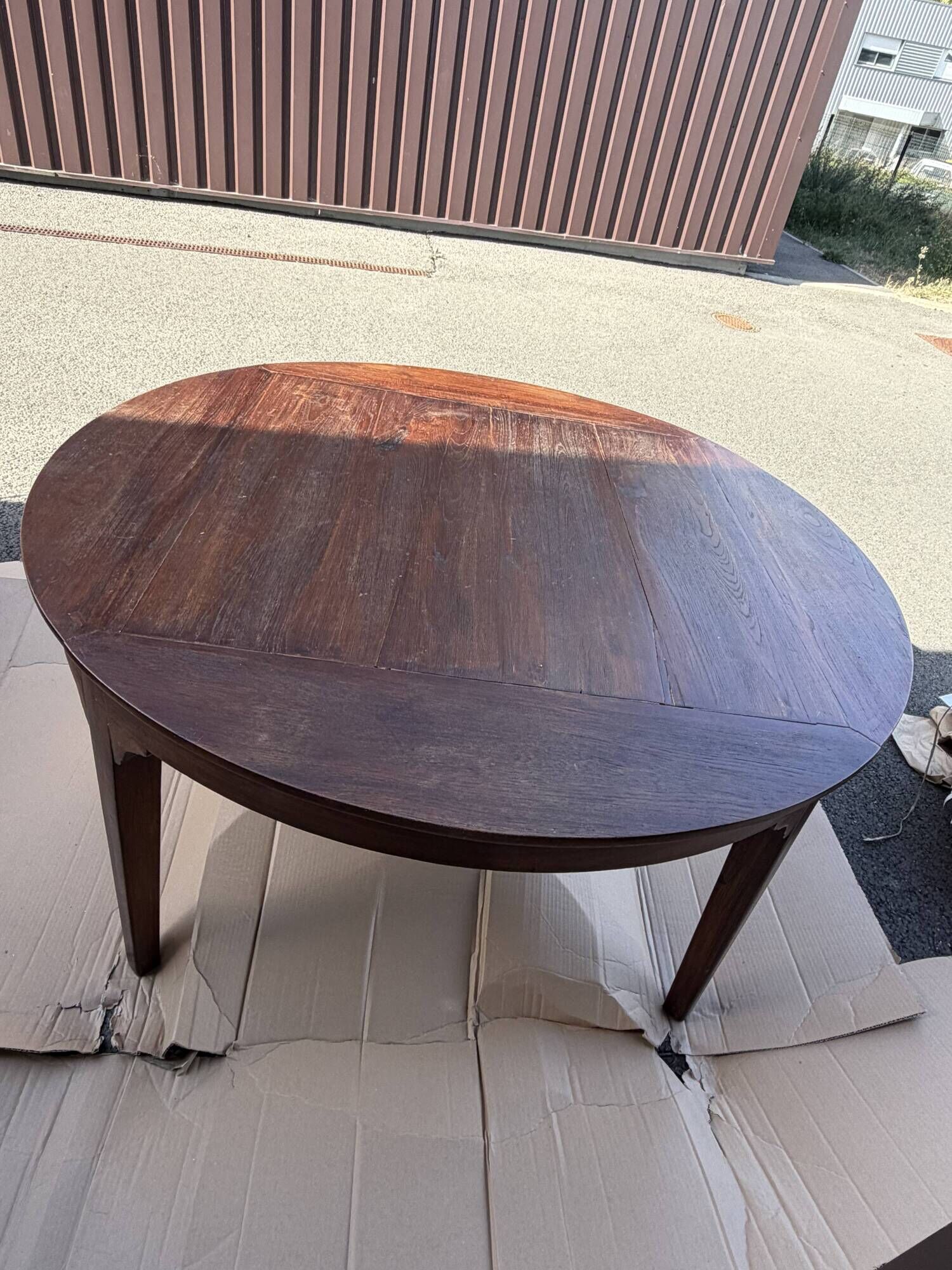 Round teak table 150 cm with 6 Indonesian chairs.
