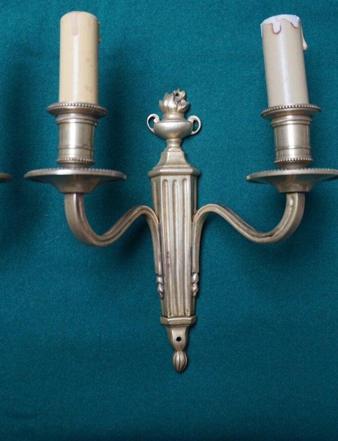 Pair of bronze wall sconces