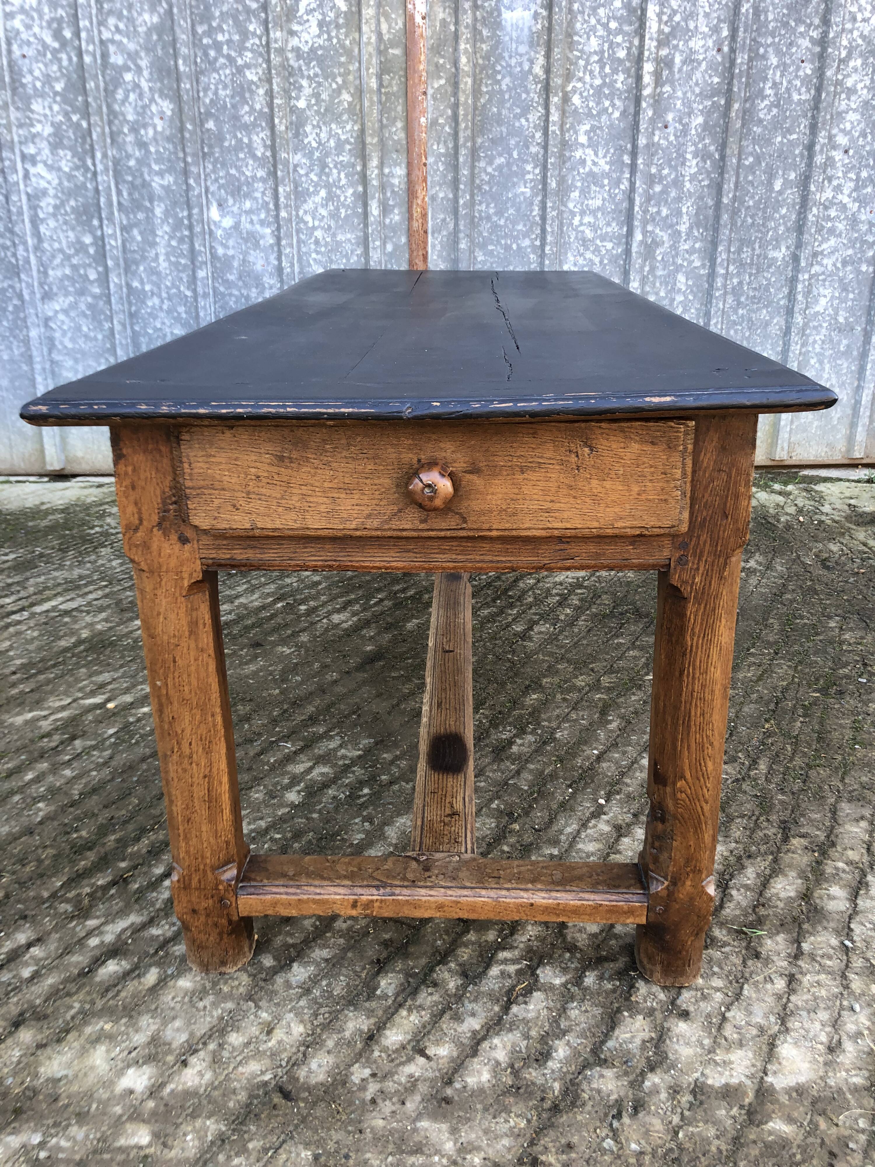 Antique oak farmhouse table with cat bar and 2 end drawers