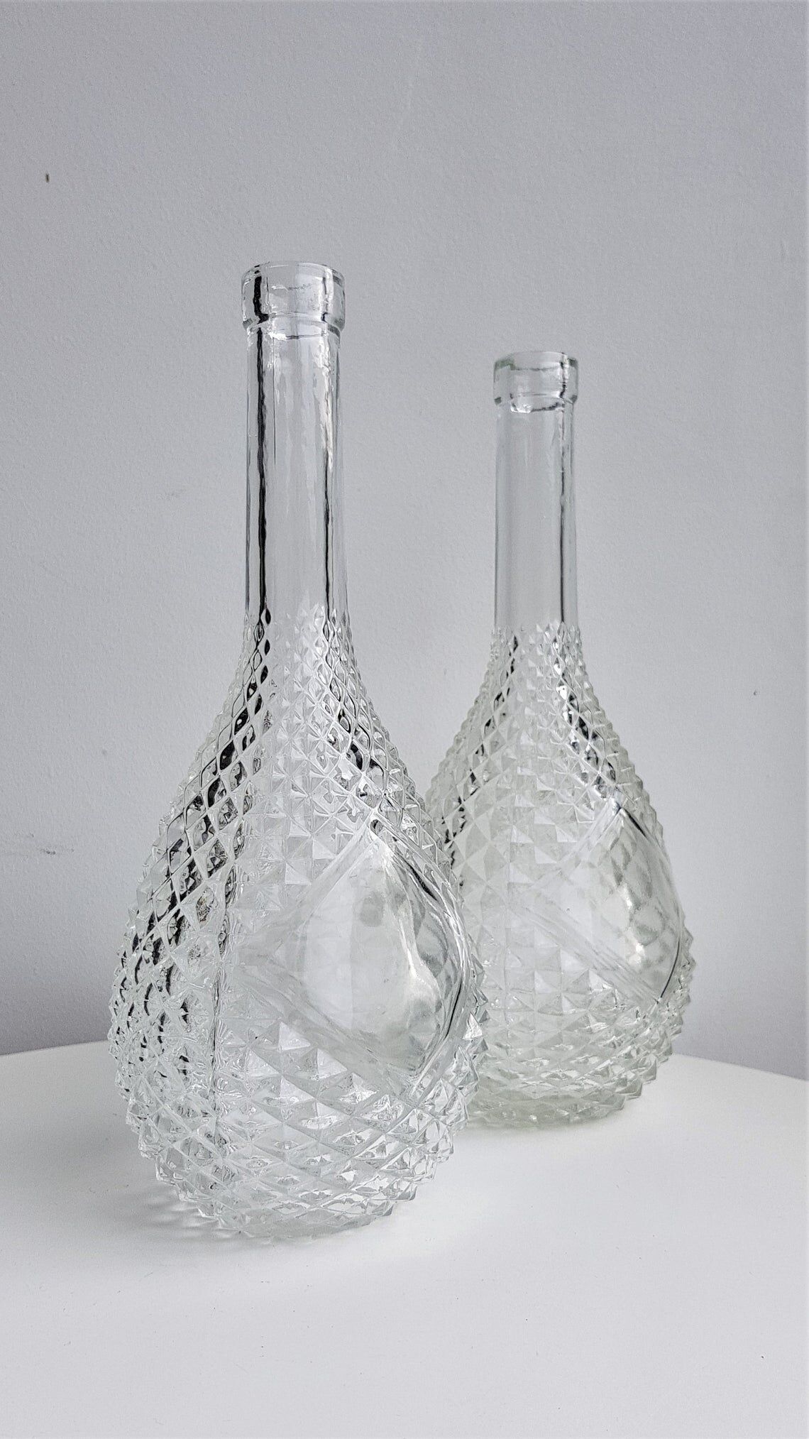 Lot of two glass bottles