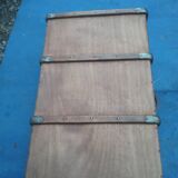Flat trunk with wrought iron closures