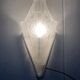 Pair of art deco metal and satin pressed glass sconces