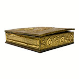 Old wooden box decorated with carved gold metal repelled vintage butterfly