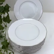 10 white porcelain dessert plates