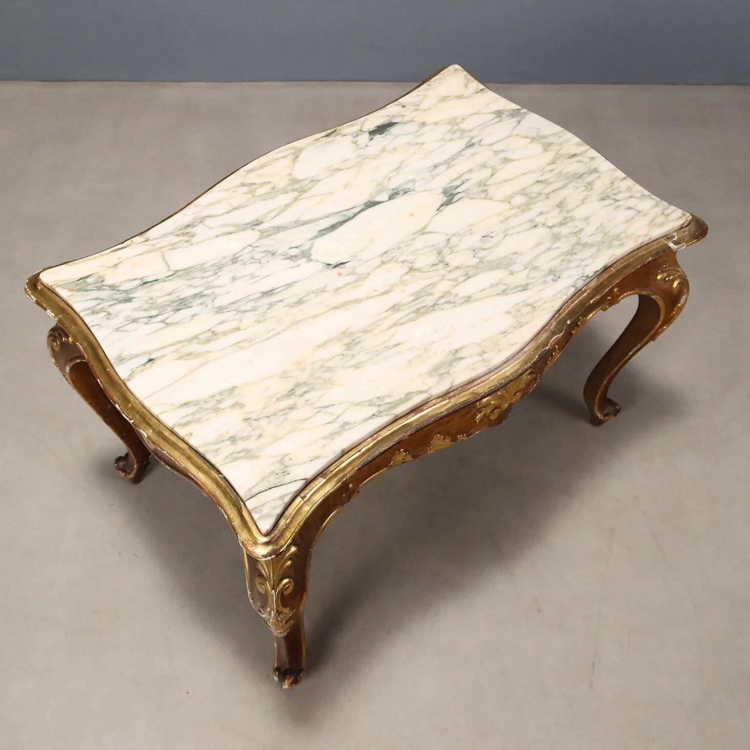 Small antique baroque-style table in carved fir and marble from the 19th century.