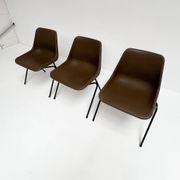 Brown and black set of 6 Polyprop chairs on a metal frame. The Polyprop cha
