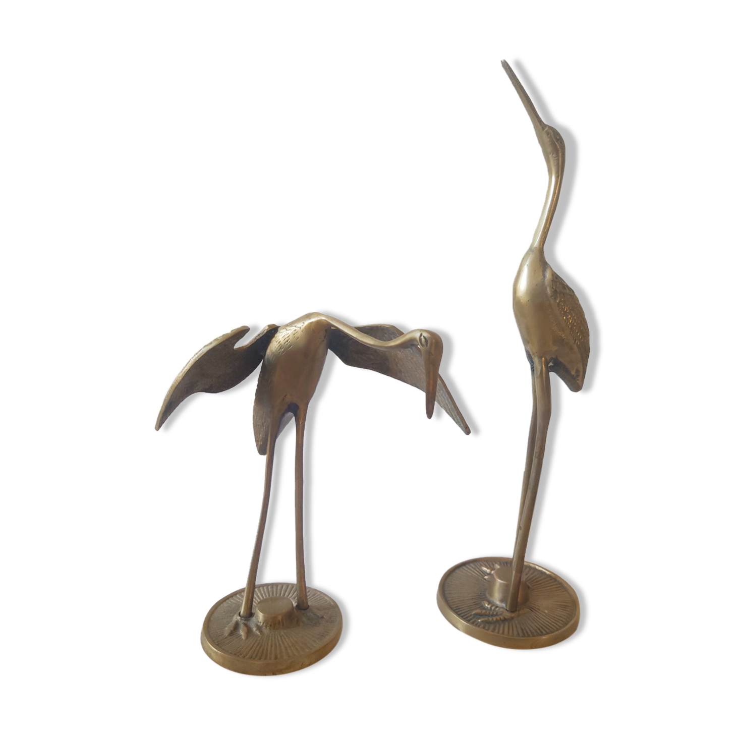 Brass heron duo