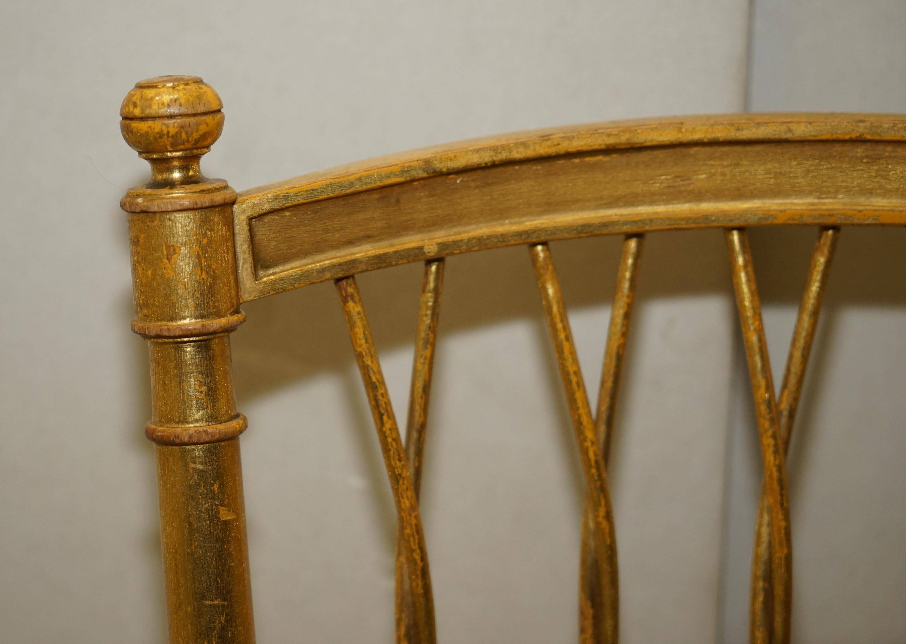 Spencer family gilded wooden bergère bench chair