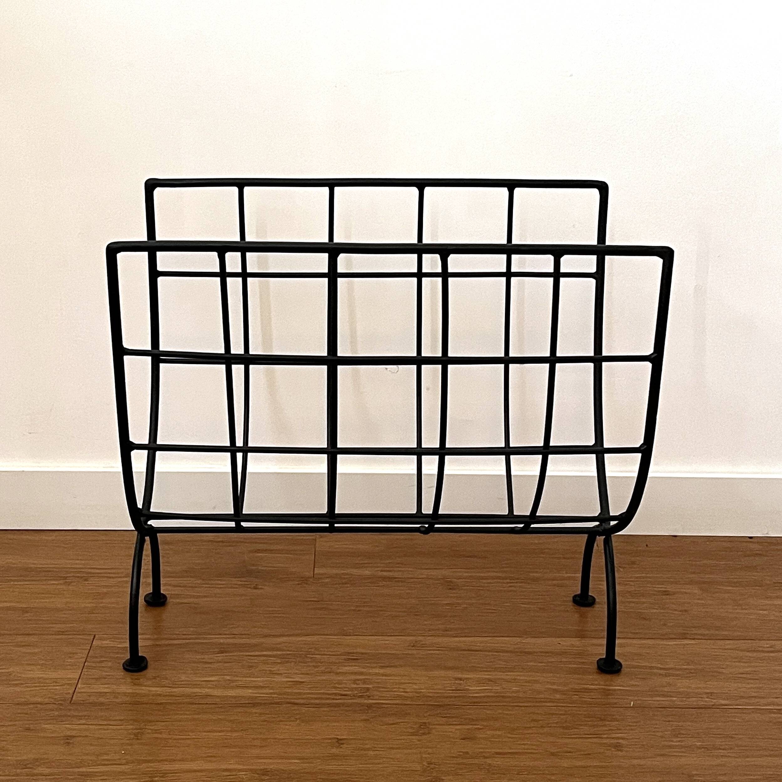 Black metal magazine rack