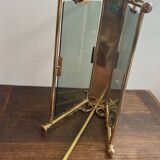 Brass magazine rack and blue-tinted glasses, 1950s.