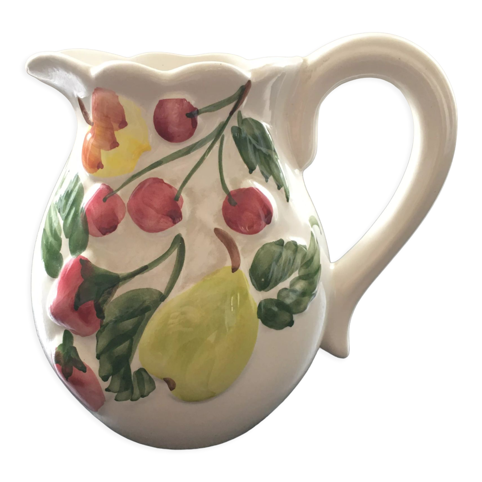 Fruit-decorated pitcher in slipware