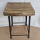 Old workshop stool in wood + wrought iron