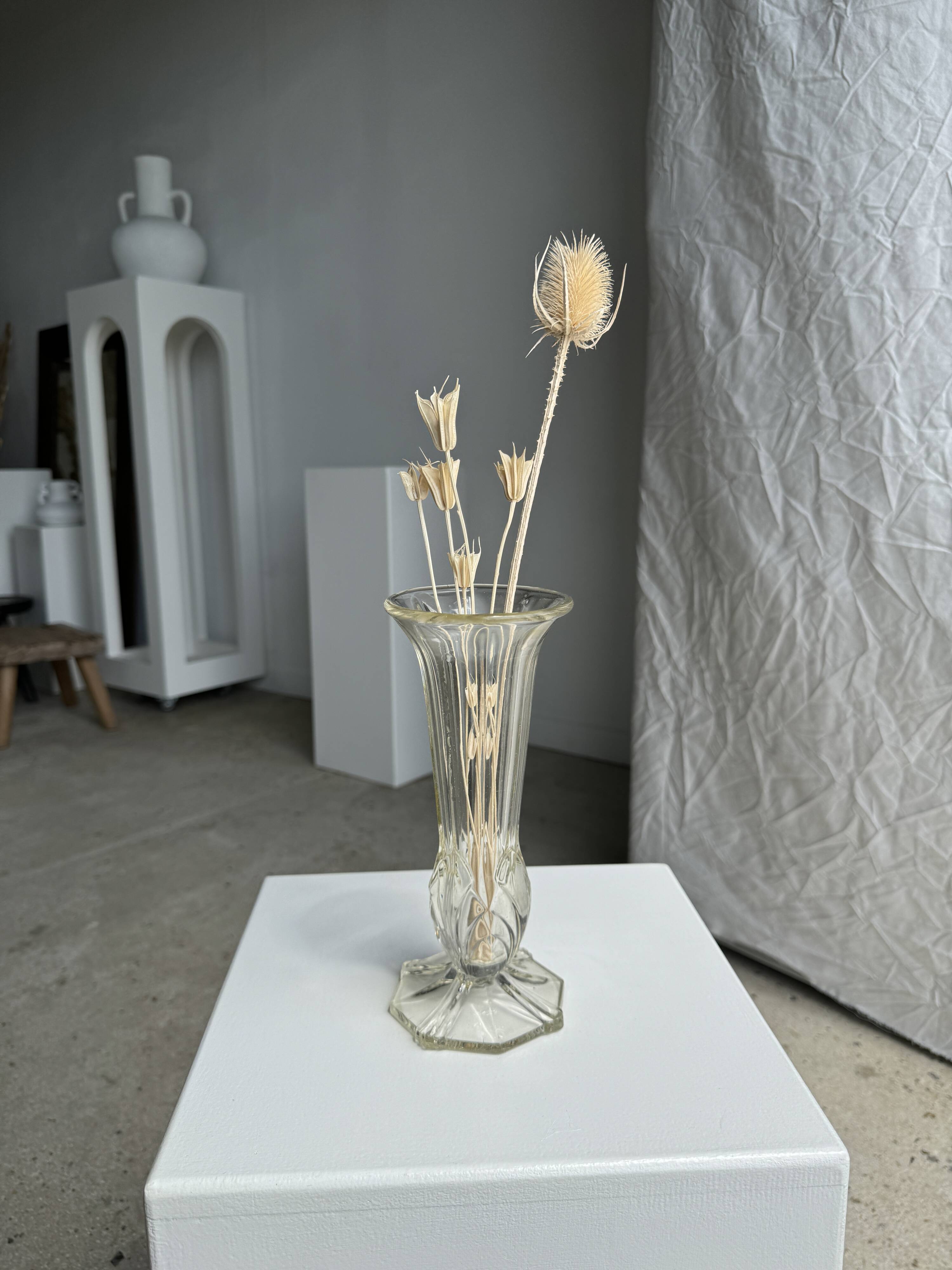 Art deco style flared neck pedestal vase in blown glass