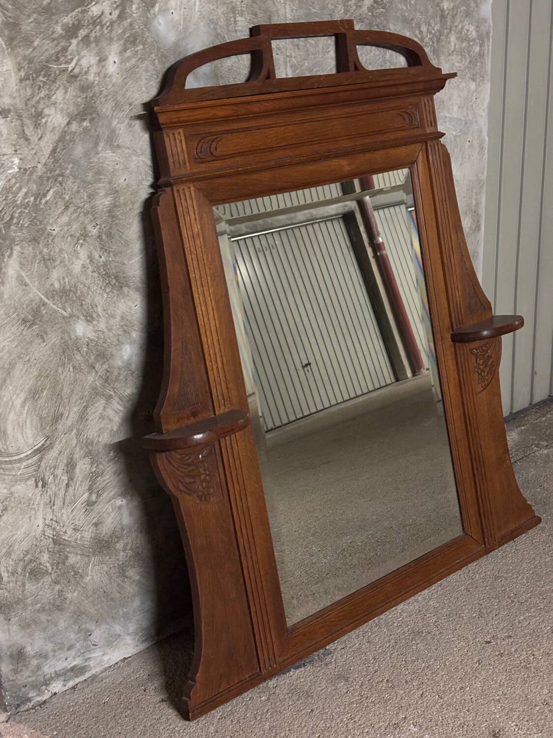 Molded and carved wooden trumeau