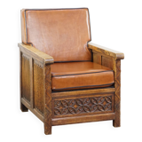 Fauteuil ancien en peau de mouton retapissée