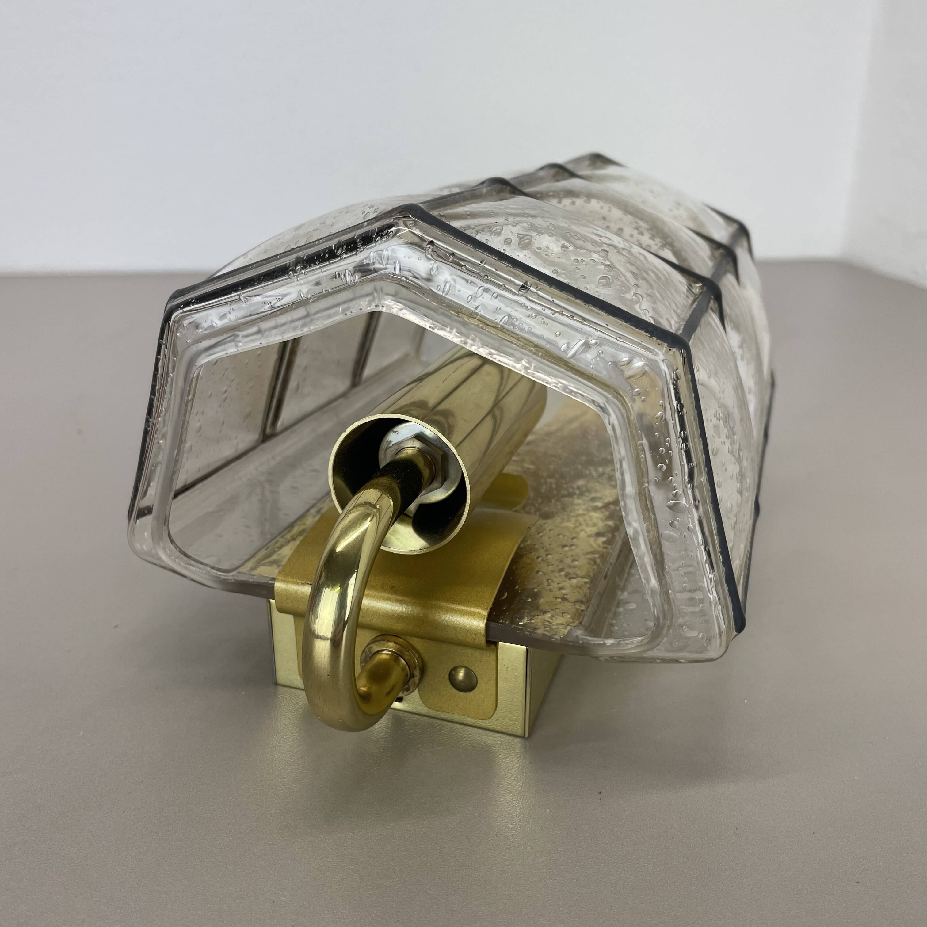 Wall light "Iron Rings" in brass and glass by Glashütte Limburg, Germany, 1970s