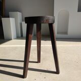 Small high tripod stool in brown solid wood